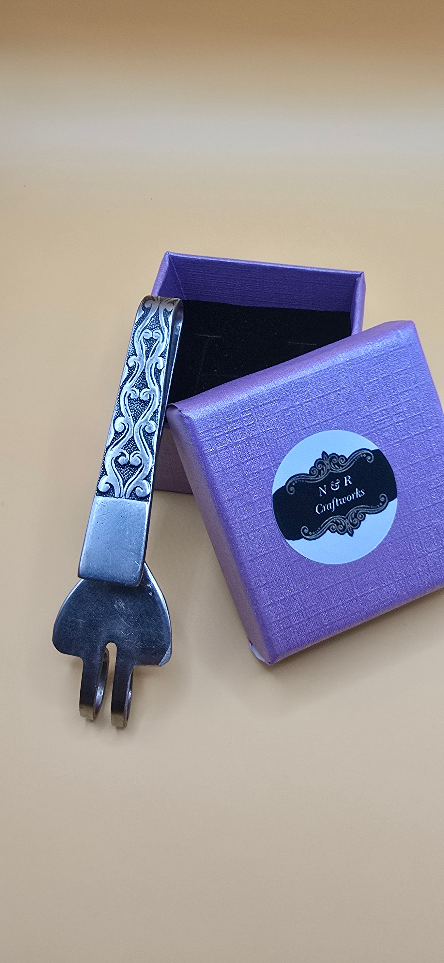 Stainless steel fork repurposed into one of a kind keyholder