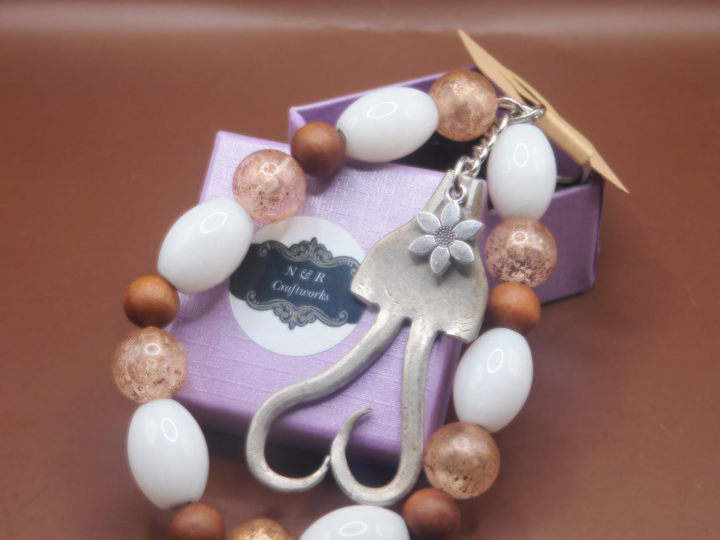 Repurposed fork made into curved heart keychain