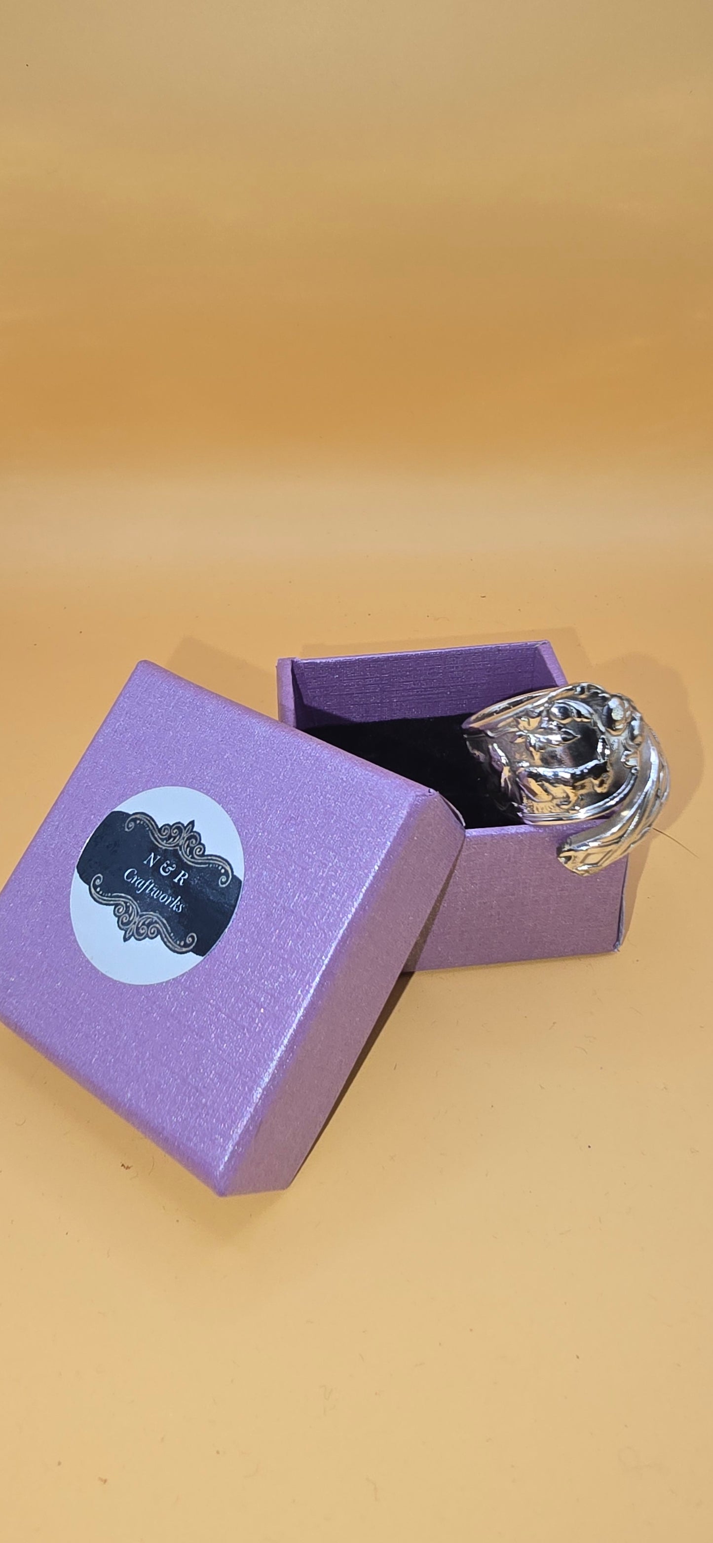 show your love for rabbits with this elegant wrap ring