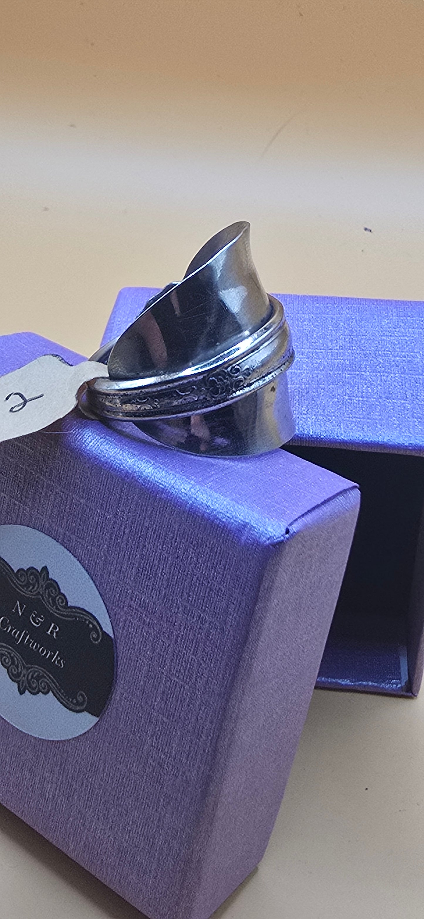 Own a piece of history with this sterling silver saddle ring.