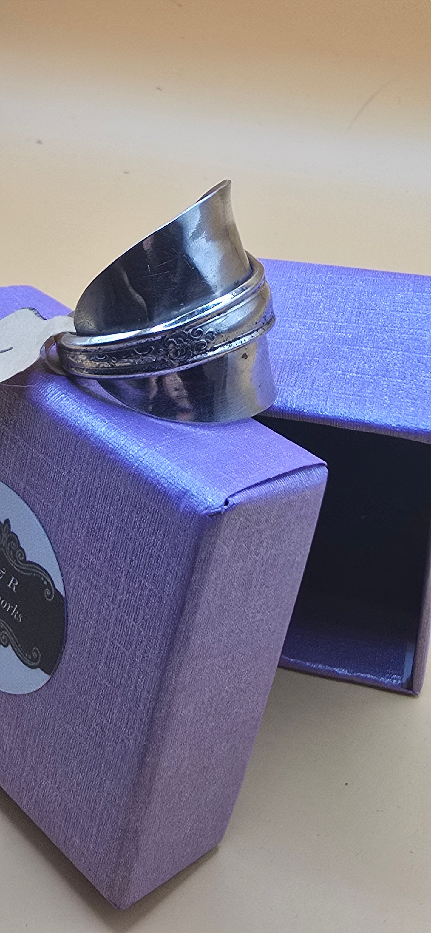 Own a piece of history with this sterling silver saddle ring.