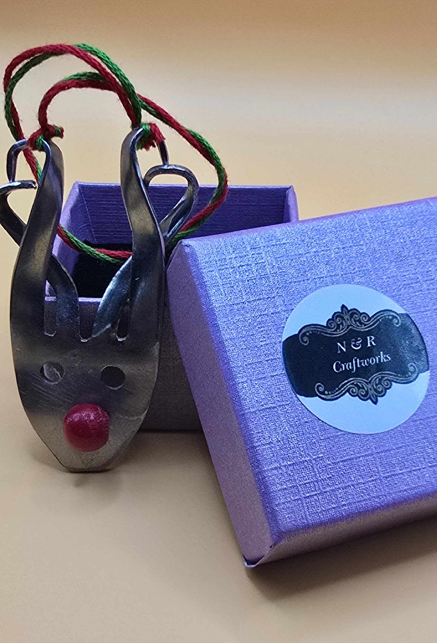 Cherish the Christmas season with this handcrafted reindeer ornament