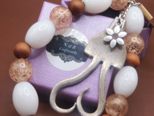 Repurposed fork made into curved heart keychain