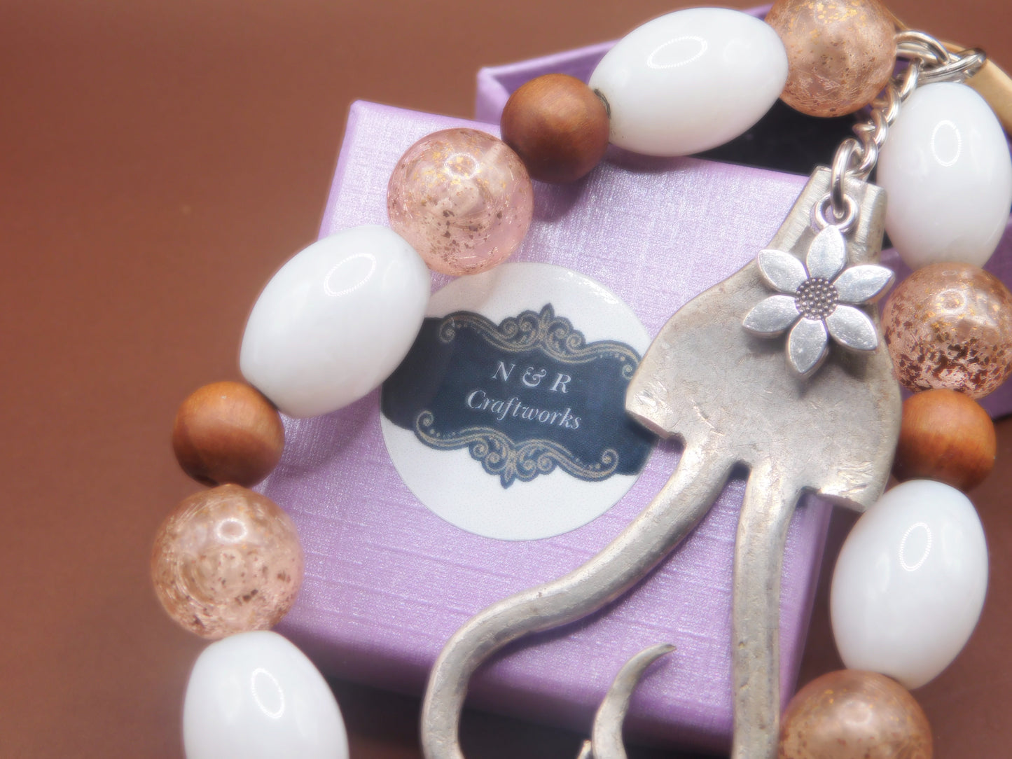 Repurposed fork made into curved heart keychain