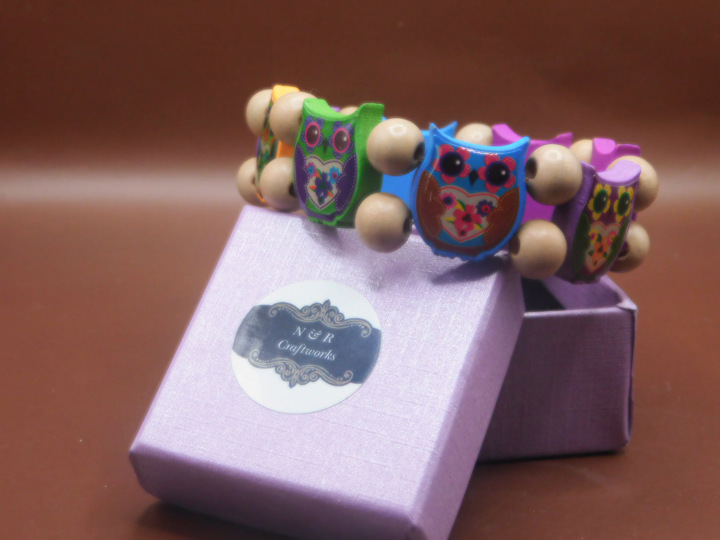 Multicolored wood beads owl inspired braclet