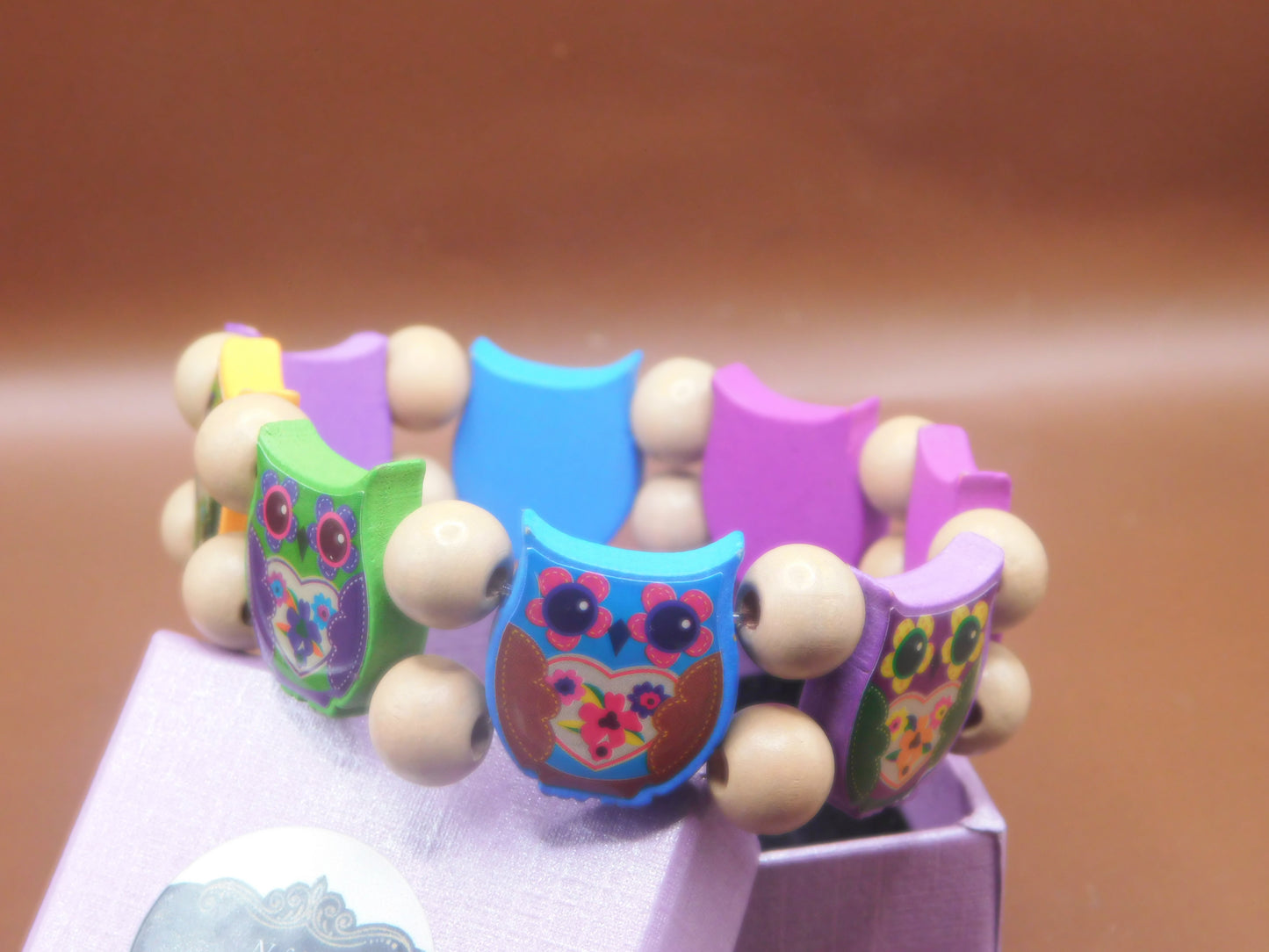 Multicolored wood beads owl inspired braclet