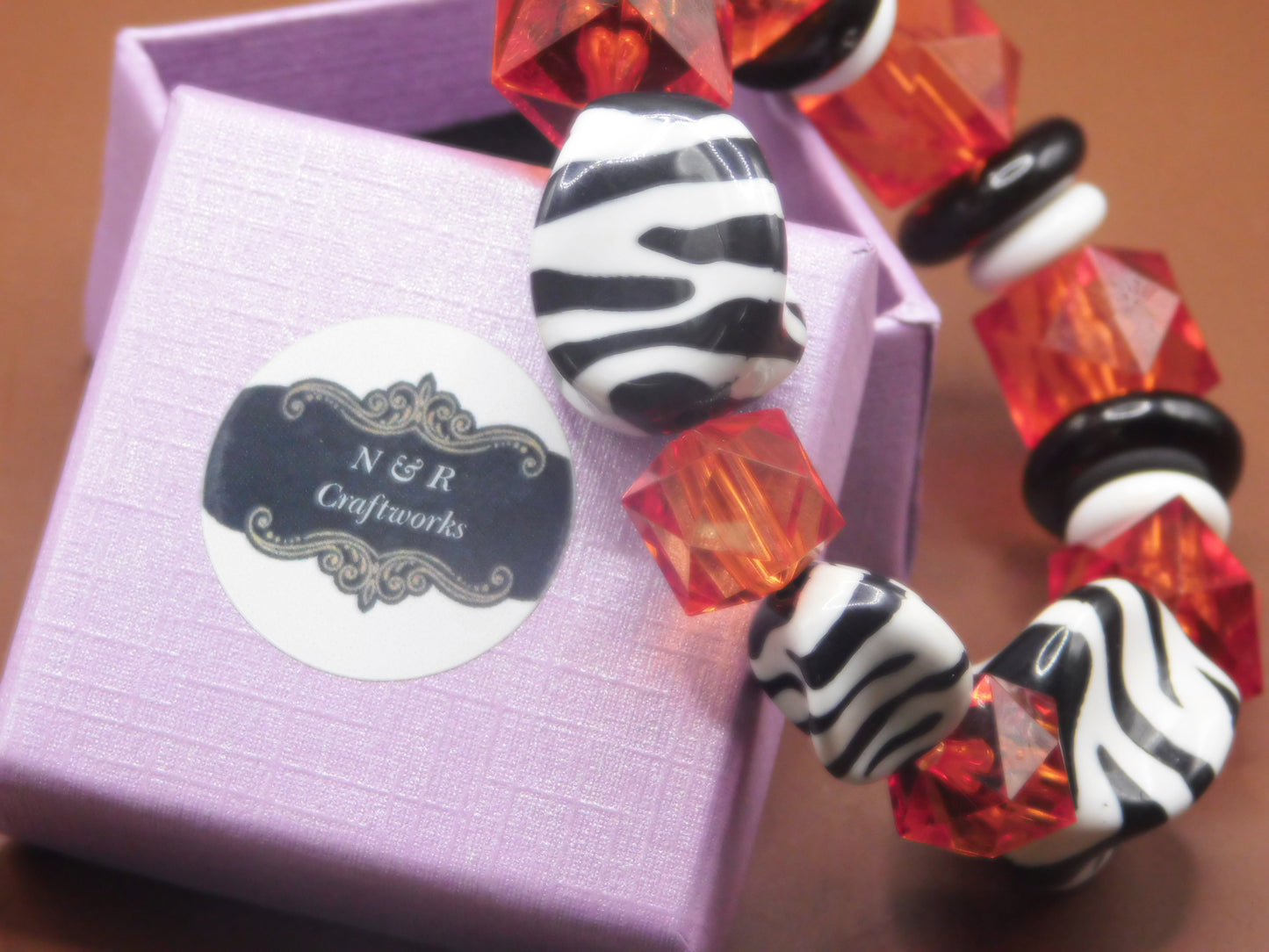 Acrylic beaded bracelet with Zebra patterns