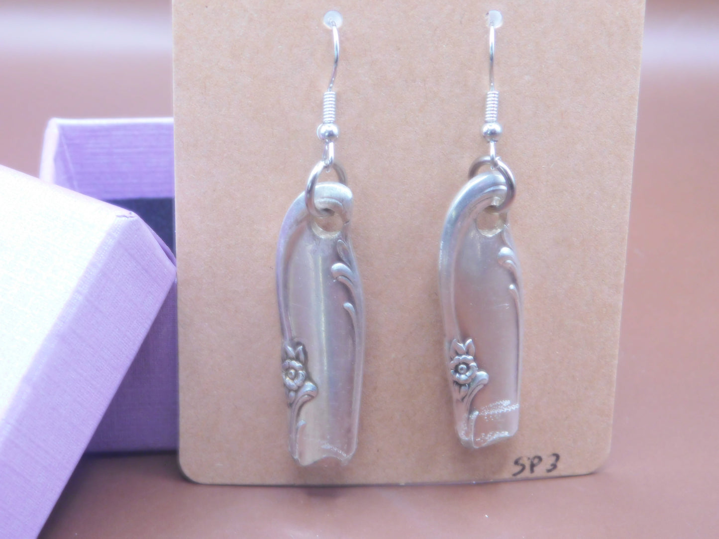 Add elegance and charm with these repurposed, vintage silver-plated spoon handle earrings